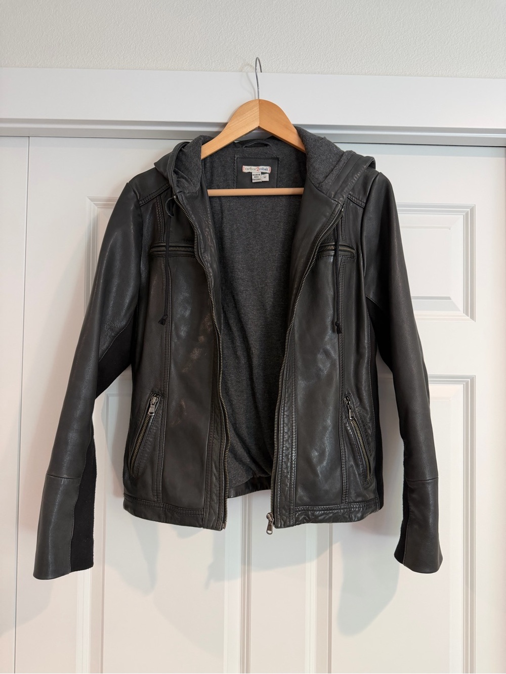 Women’s Hooded Black Faux Leather Jacket with Knit Lining